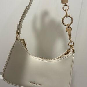 Charles & Keith Cream Shoulder Bag with Gold Accents